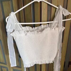 Cute white tank with adjustable tie straps, worn once